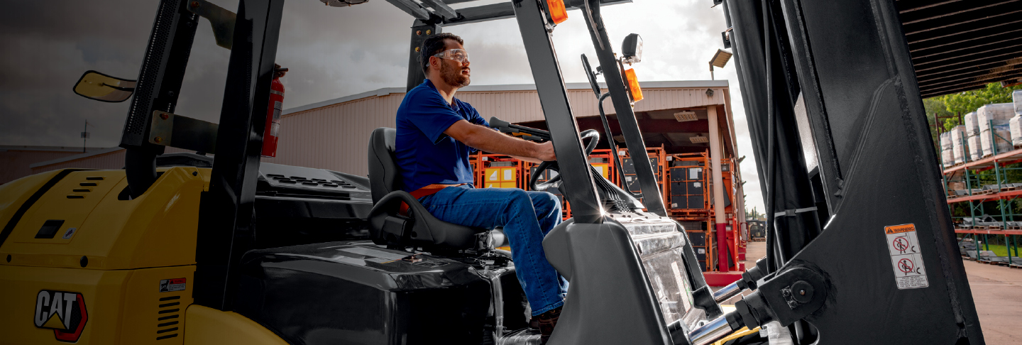 Man working on Cat Lift Truck